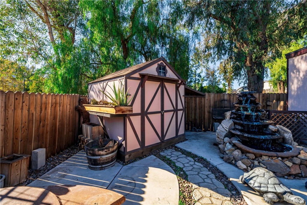 24553 Maitri Road Temescal Valley, CA 92883 - Photo 27 of 36 Storage shed