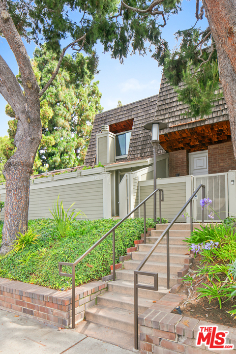 4340 Glencoe Avenue, Unit 2 Marina del Rey, CA 90292 - Photo 2 of 3 a house that has a tree in front of the house
