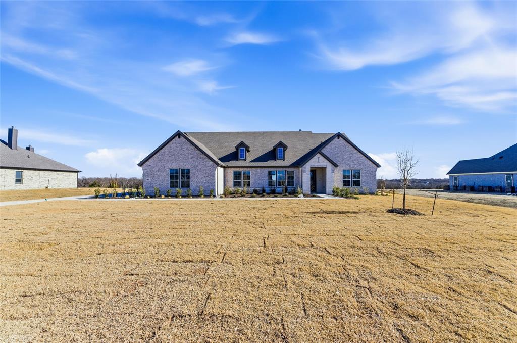 805 Vly Rdg Road Van Alstyne, TX 75495 - Photo 3 of 40 a house with a large pool