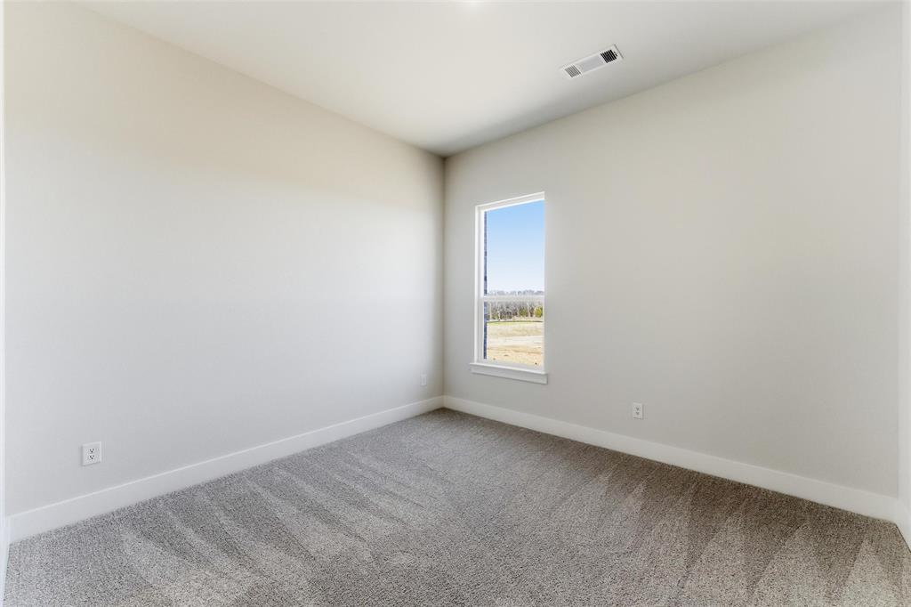 805 Vly Rdg Road Van Alstyne, TX 75495 - Photo 31 of 40 a view of an empty room with a window