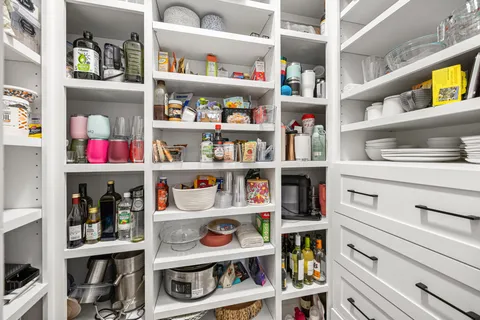 a room with a book shelf