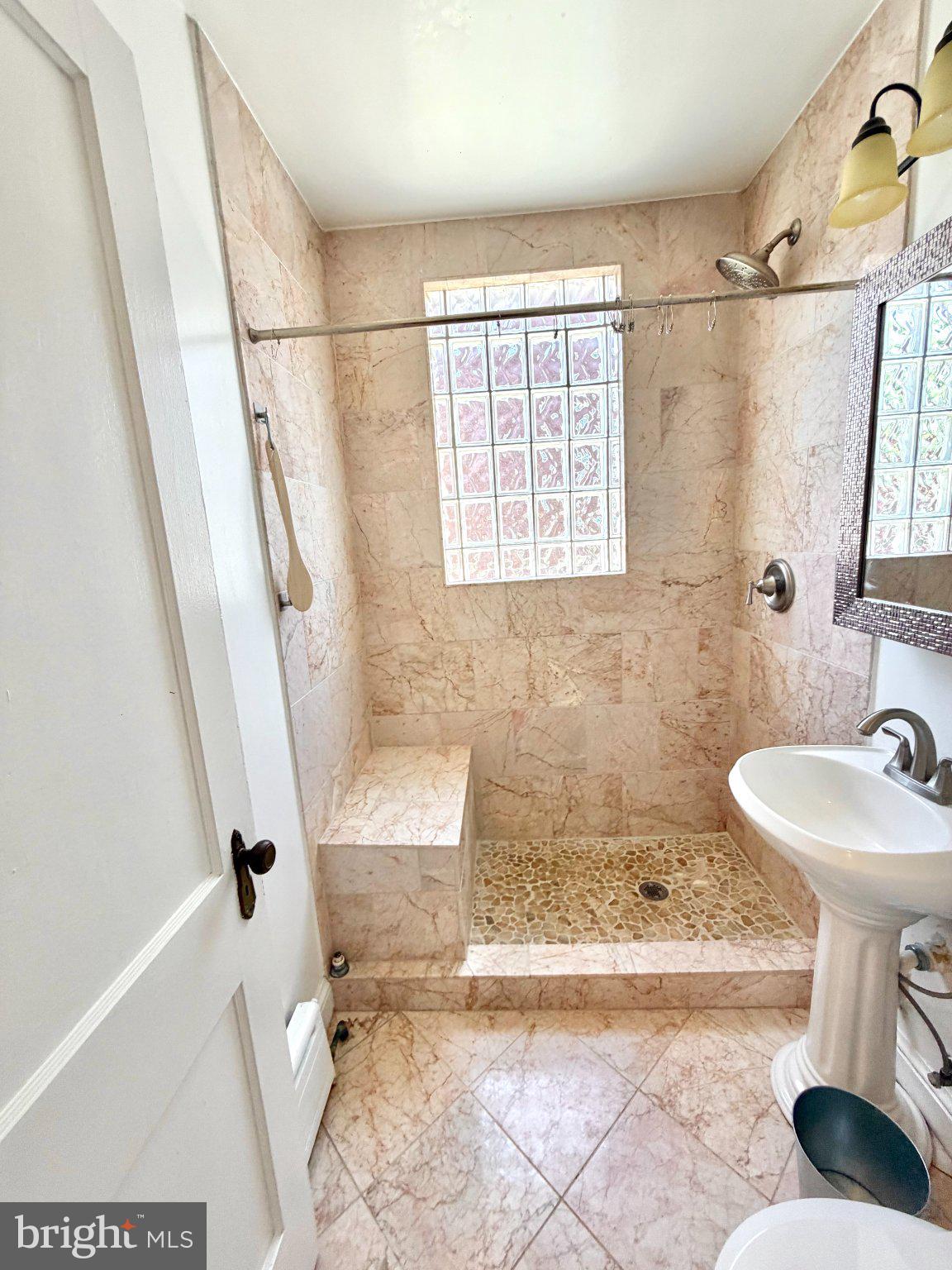 19 Hamilton Street Northeast, Unit 1 Washington, DC 20011 - Photo 12 of 17 Elegant marble shower retreat.