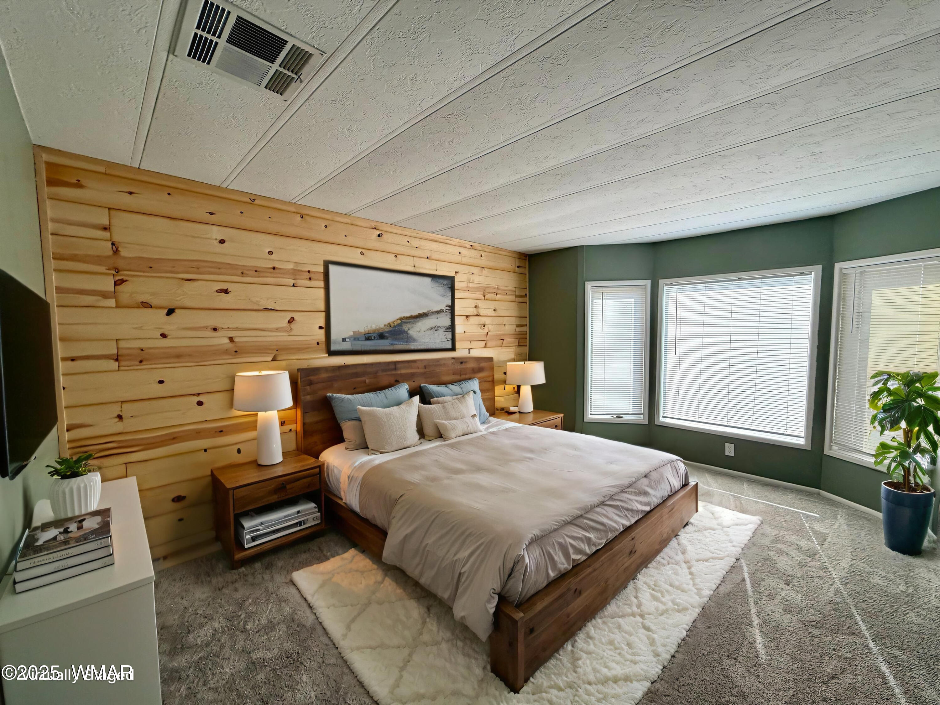 3908 South Freeman Holw Road Snowflake, AZ 85937 - Photo 1 of 31 a bedroom with a bed a dresser next to a window