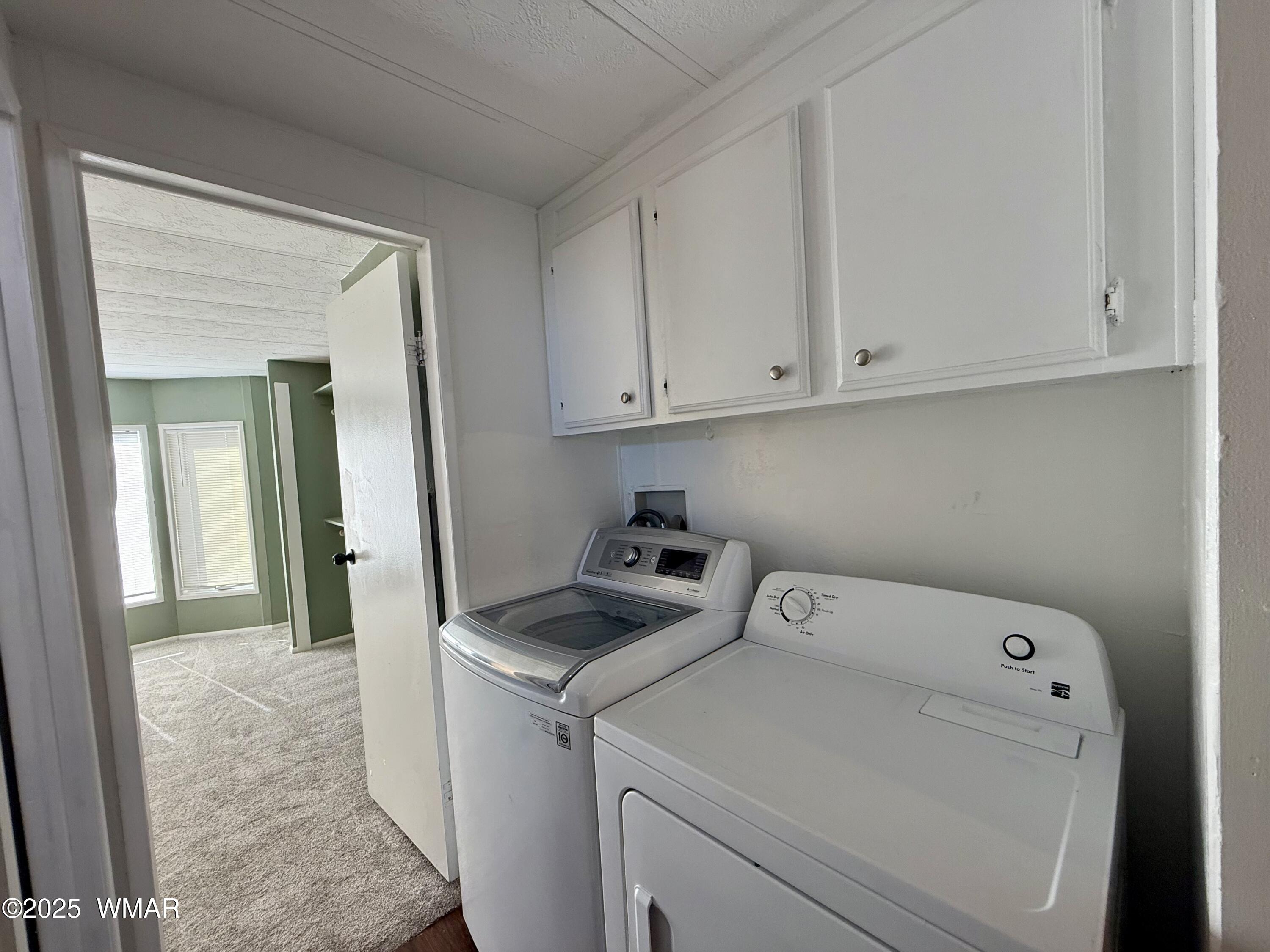 3908 South Freeman Holw Road Snowflake, AZ 85937 - Photo 9 of 31 a utility room with dryer and washer