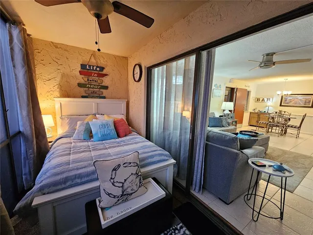 a bedroom with furniture and a window