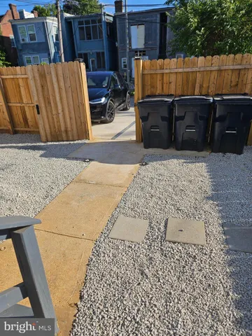 a view of a backyard of the house