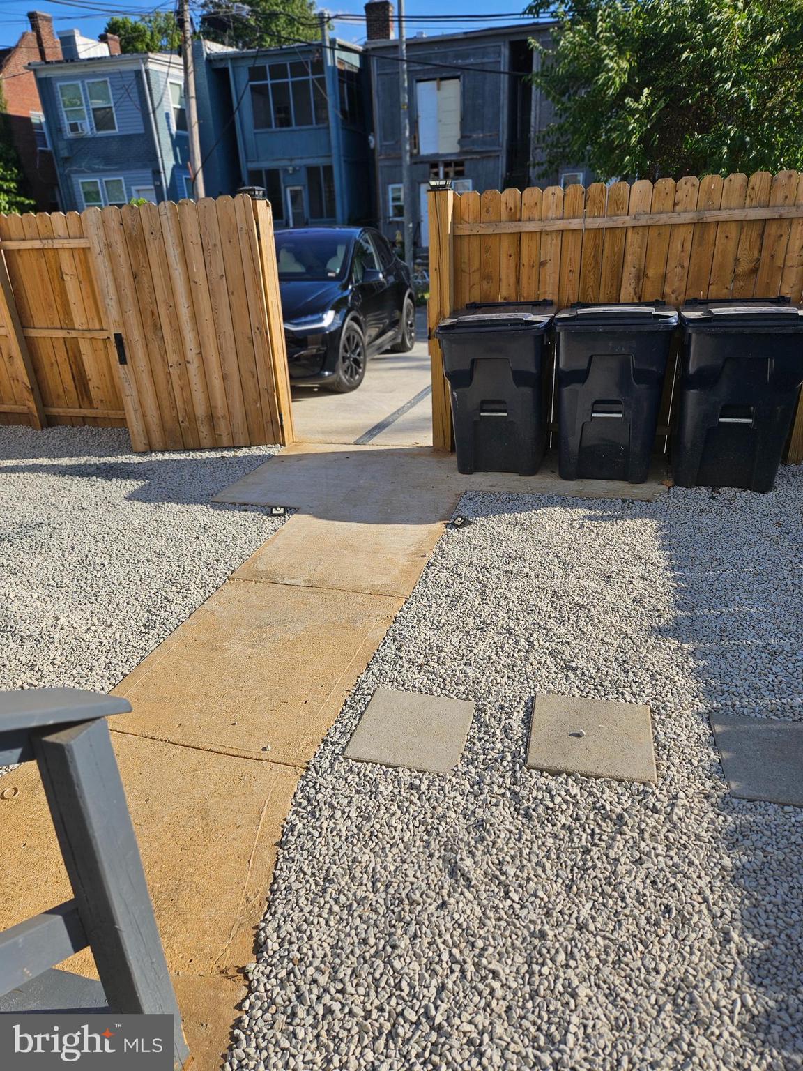 1223 Simms Place Northeast, Unit 1 Washington, DC 20002 - Photo 3 of 48 a view of a backyard of the house