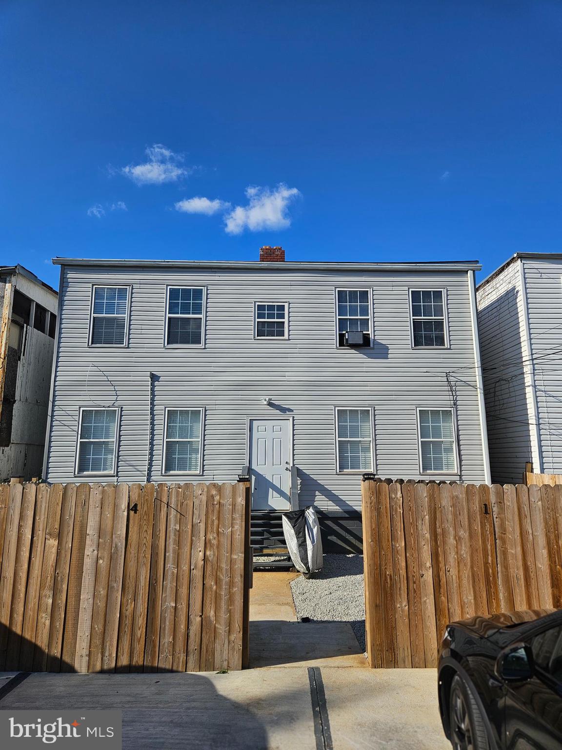 1223 Simms Place Northeast, Unit 1 Washington, DC 20002 - Photo 42 of 48 a view of a brick house with many windows