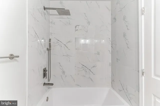 a bathroom with a bathtub