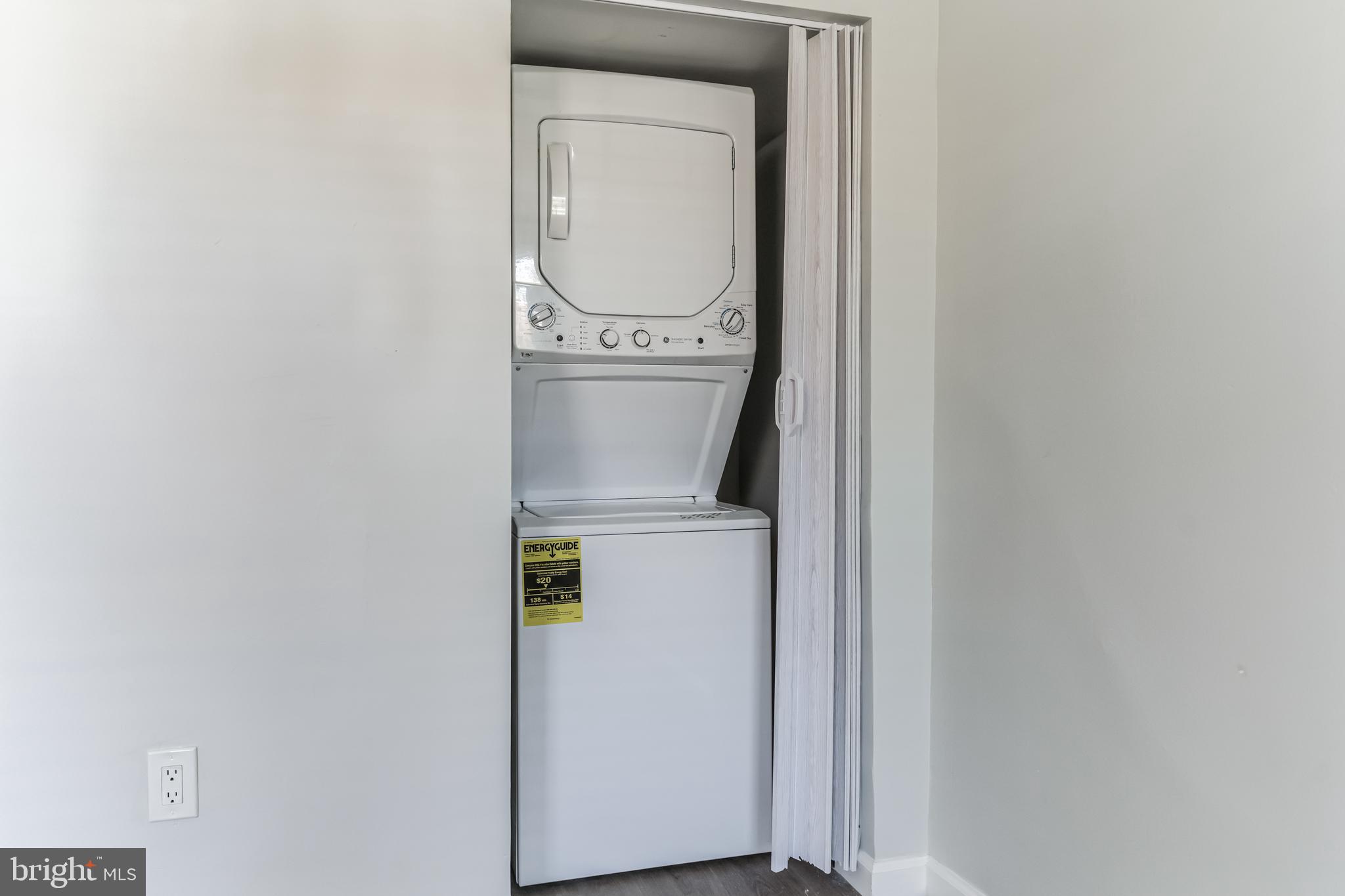 1223 Simms Place Northeast, Unit 1 Washington, DC 20002 - Photo 8 of 48 a utility room with dryer and washer