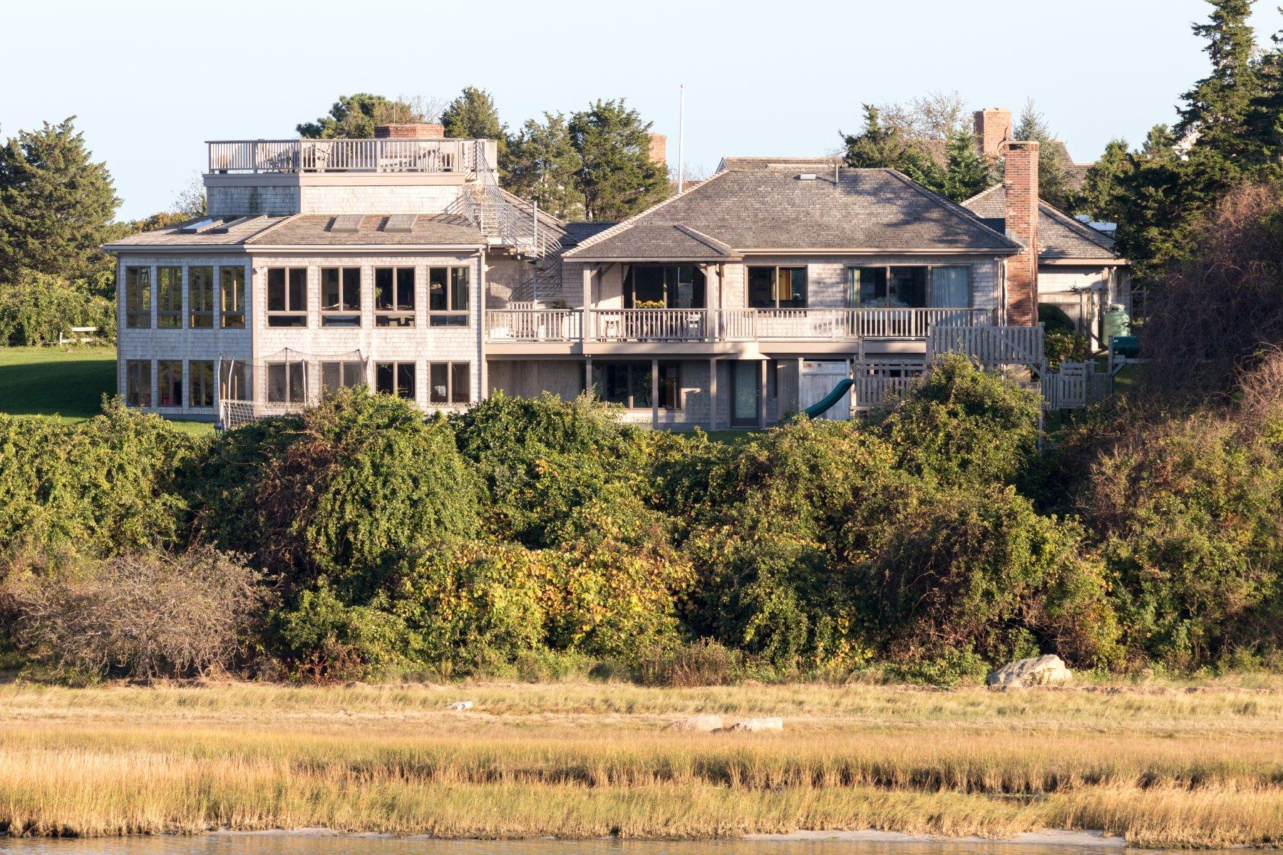 100 Freeman Lane Orleans, MA 02653 - Photo 2 of 34 a view of residential houses with a yard and lake view