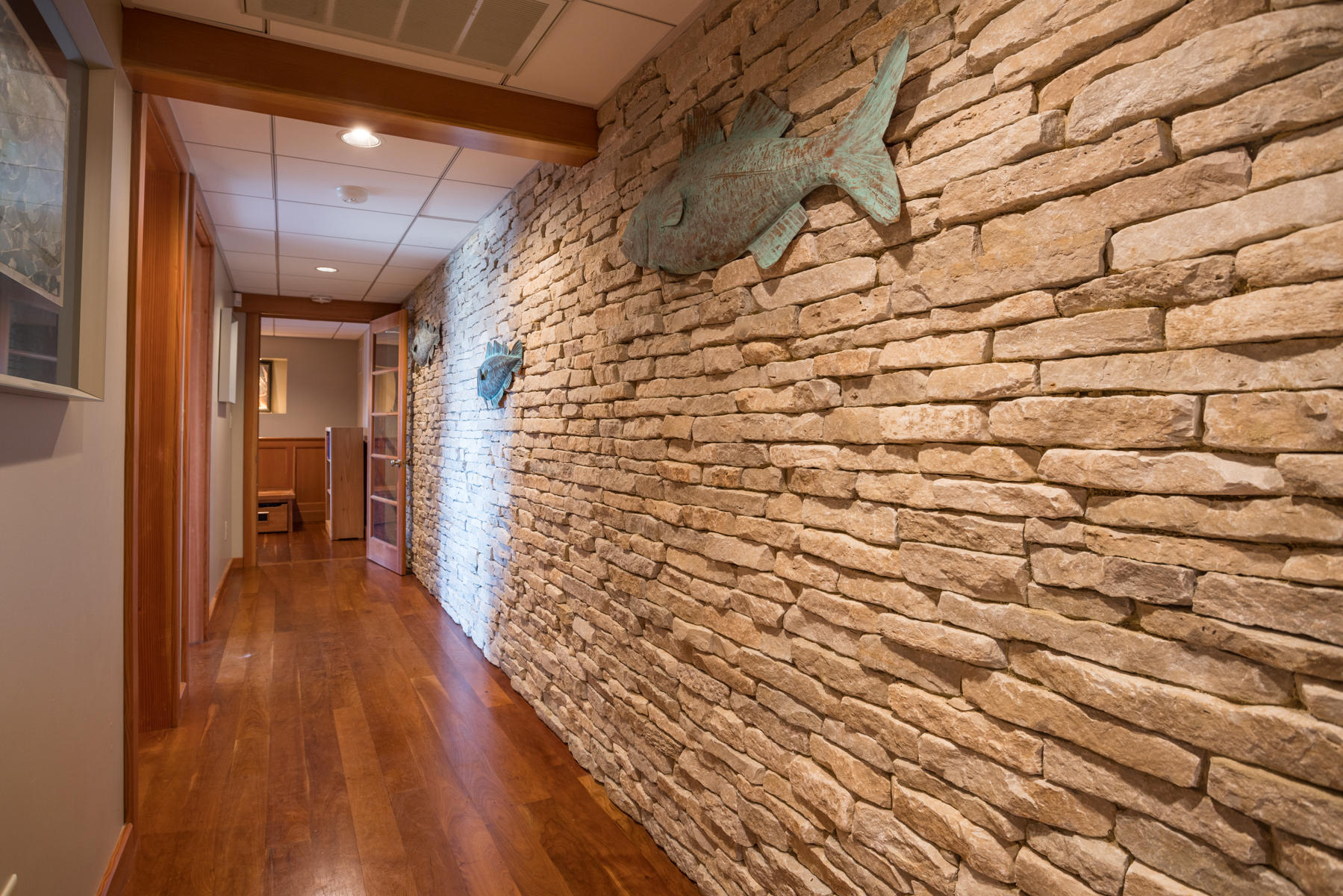 100 Freeman Lane Orleans, MA 02653 - Photo 25 of 34 a hallway with a wooden floor