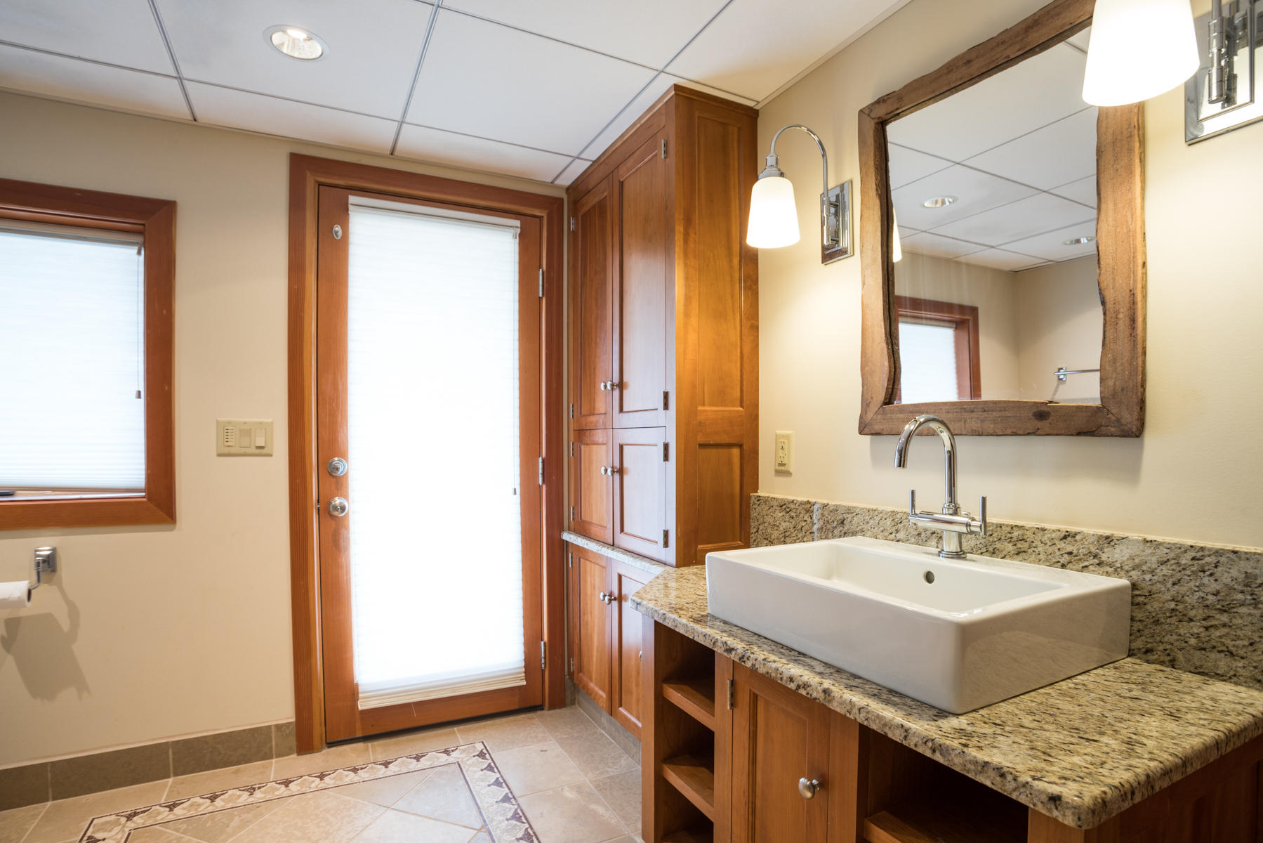 100 Freeman Lane Orleans, MA 02653 - Photo 29 of 34 a bathroom with a sink and a mirror