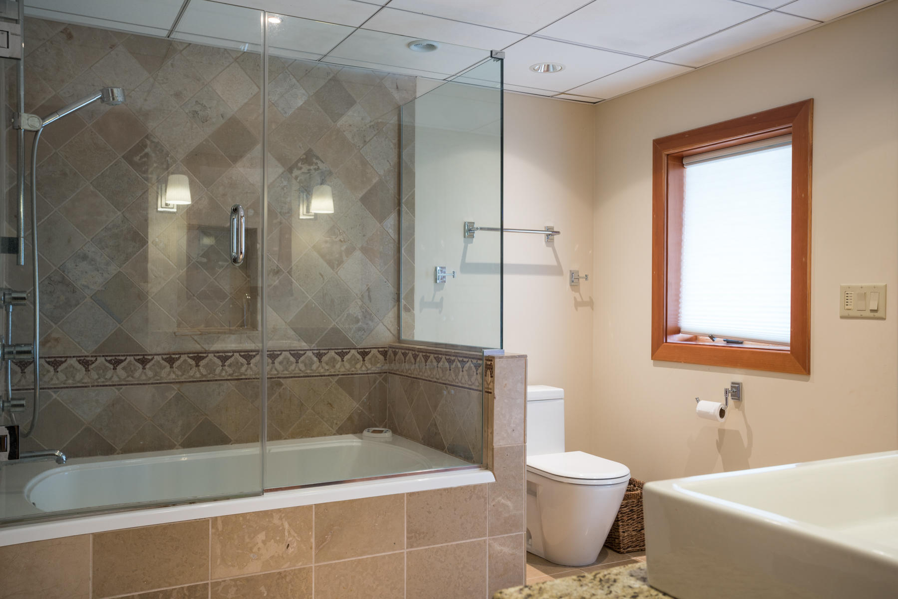 100 Freeman Lane Orleans, MA 02653 - Photo 30 of 34 a bathroom with a bathtub and a shower