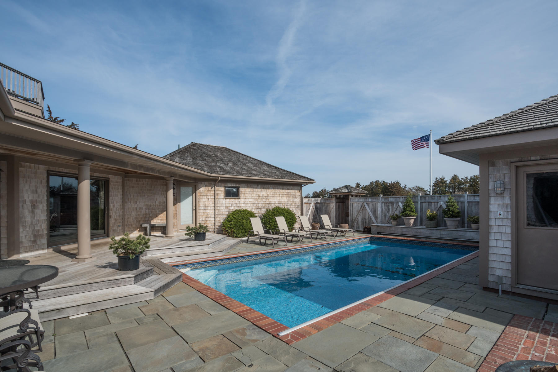 100 Freeman Lane Orleans, MA 02653 - Photo 3 of 34 an outdoor view of a house with sitting area