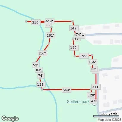 a view of backyard with green space