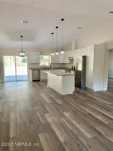 a bathroom with a shower and a toilet
