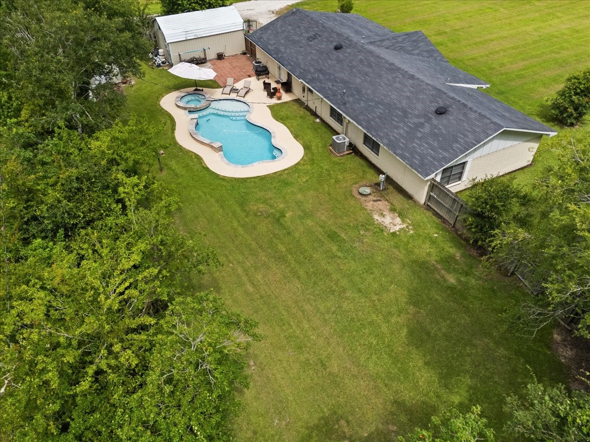 804 Otter Road Anahuac, TX 77514 - Photo 41 of 44 Aerial view of the backyard.