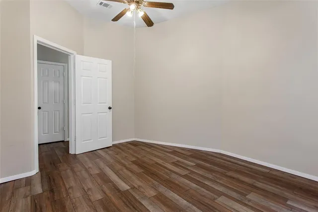 a view of a bathroom from the hallway