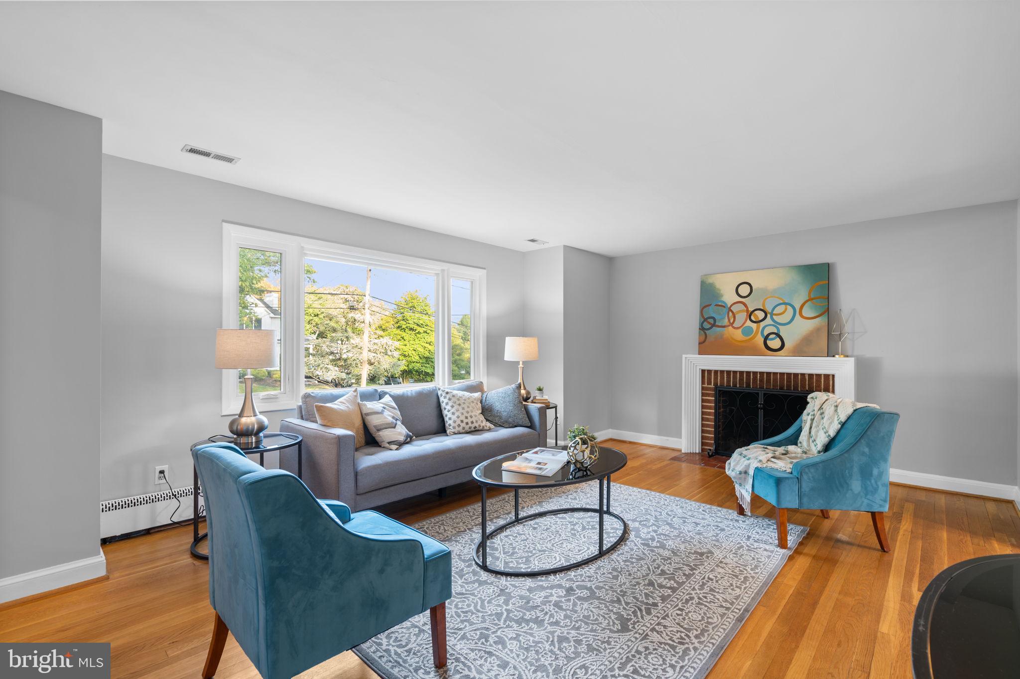 2306 Barbour Road Falls Church, VA 22043 - Photo 1 of 37 a living room with furniture and a large window