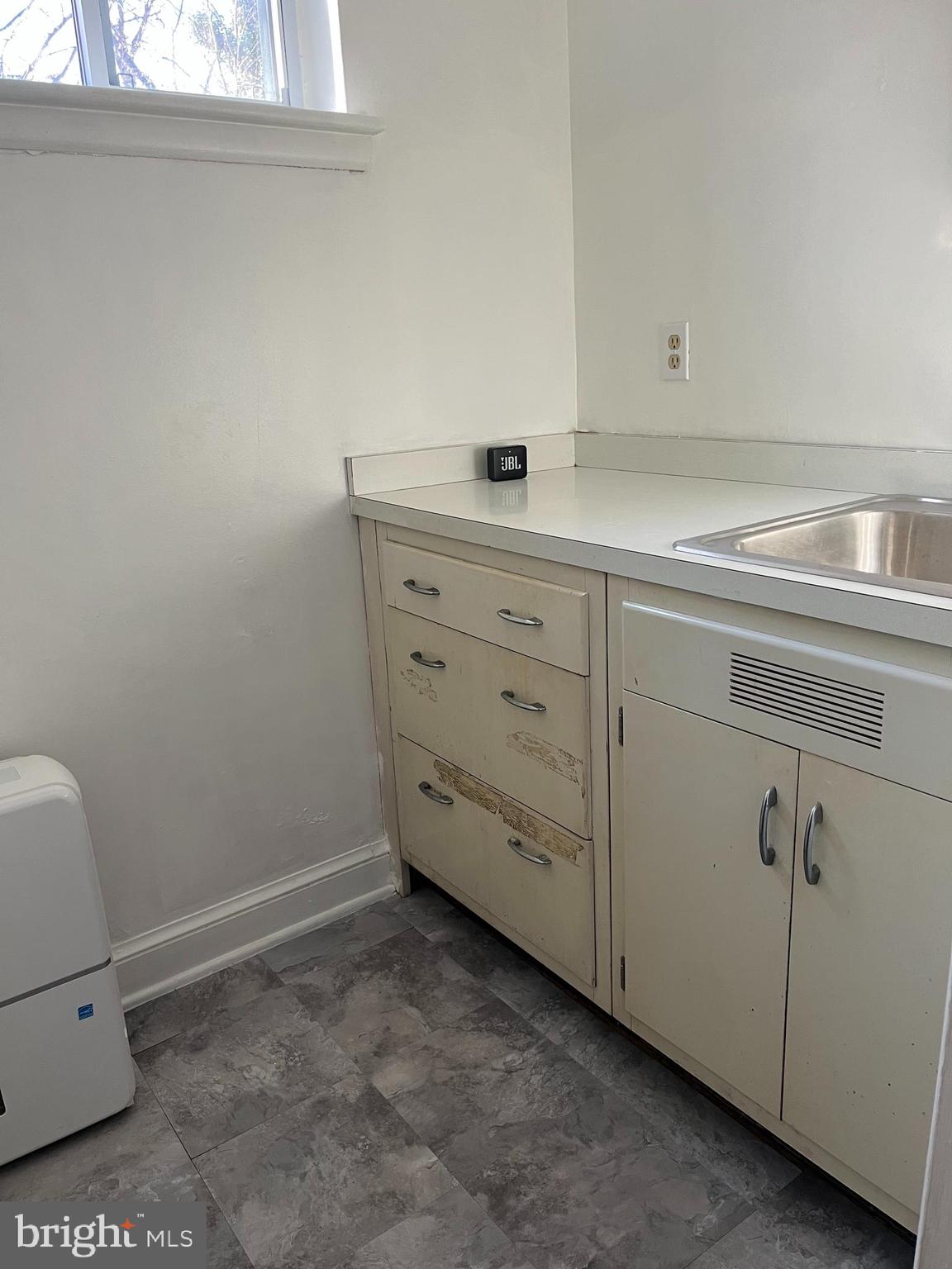 2306 Barbour Road Falls Church, VA 22043 - Photo 30 of 37 a utility room with cabinets