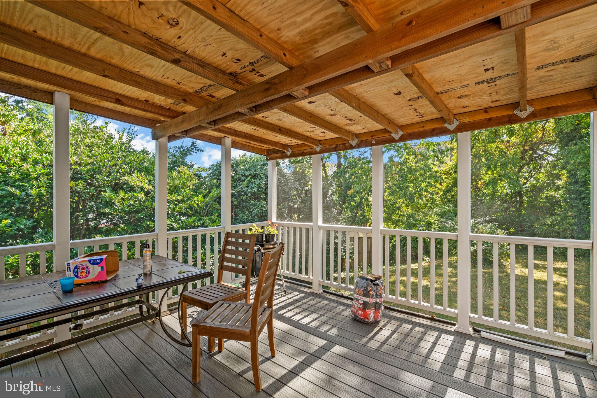 2306 Barbour Road Falls Church, VA 22043 - Photo 32 of 37 a view of a chairs in wooden deck