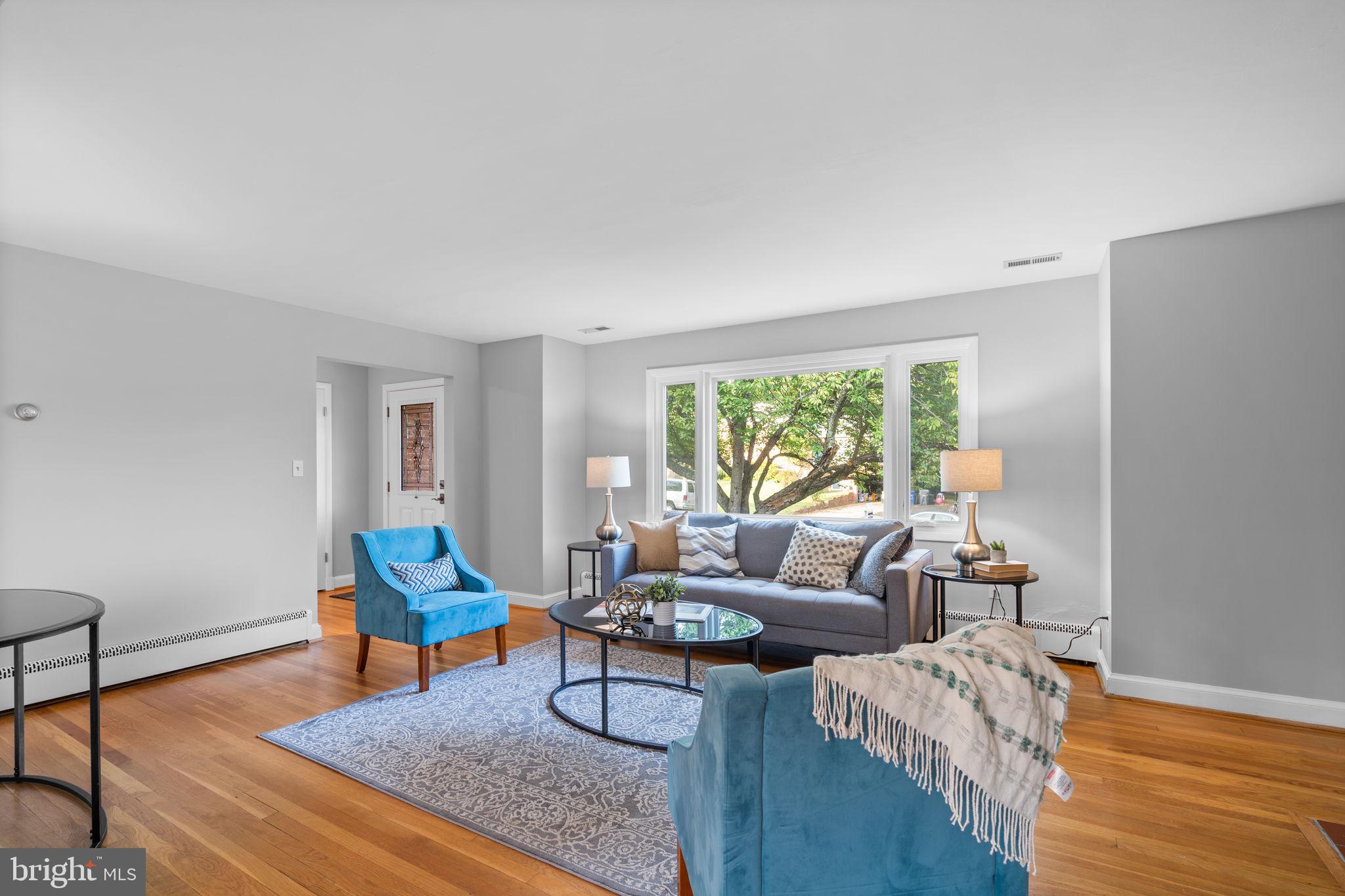 2306 Barbour Road Falls Church, VA 22043 - Photo 8 of 37 a living room with furniture and a wooden floor
