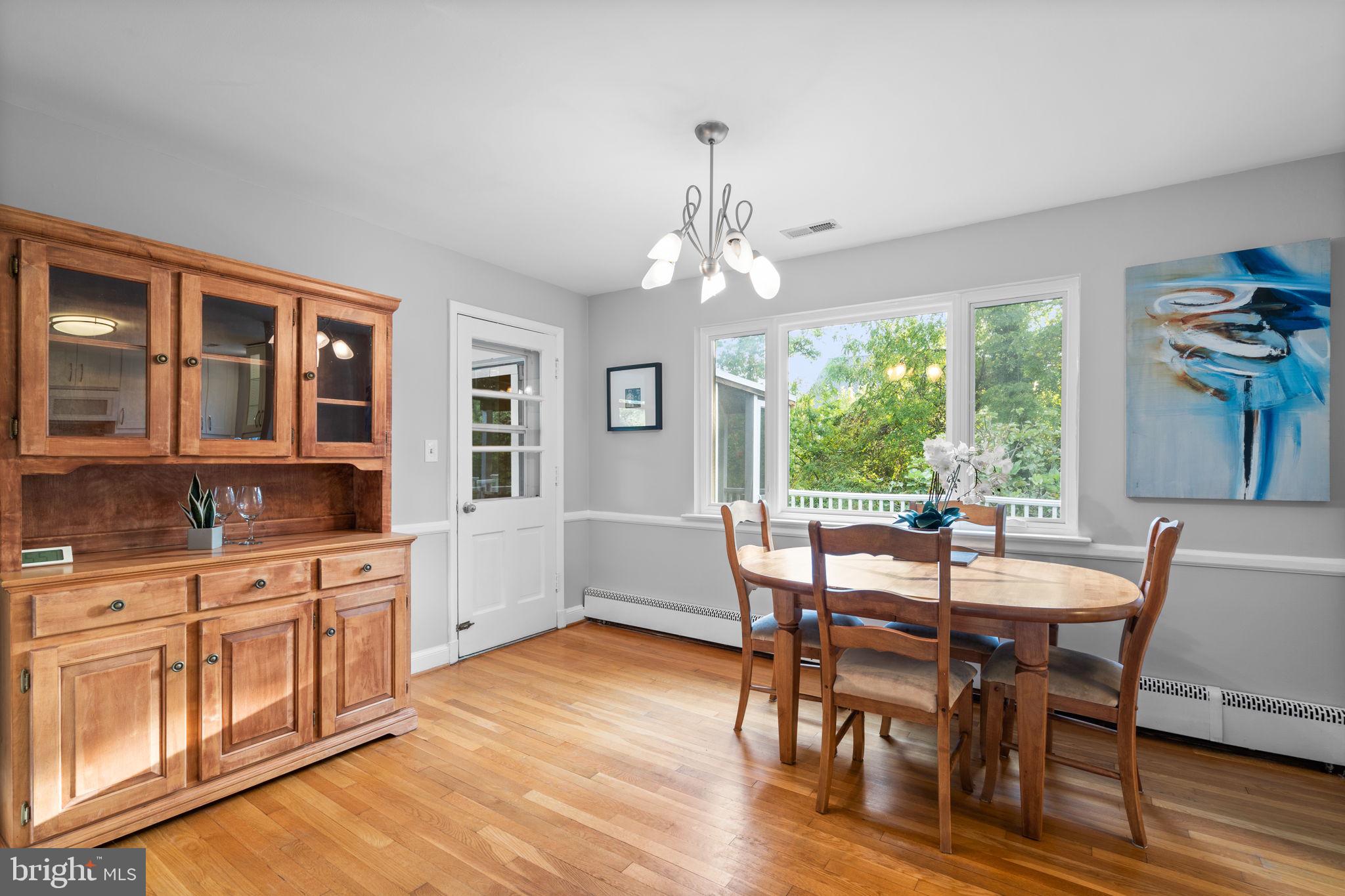 2306 Barbour Road Falls Church, VA 22043 - Photo 10 of 37 a view of a dining room with furniture window and wooden floor