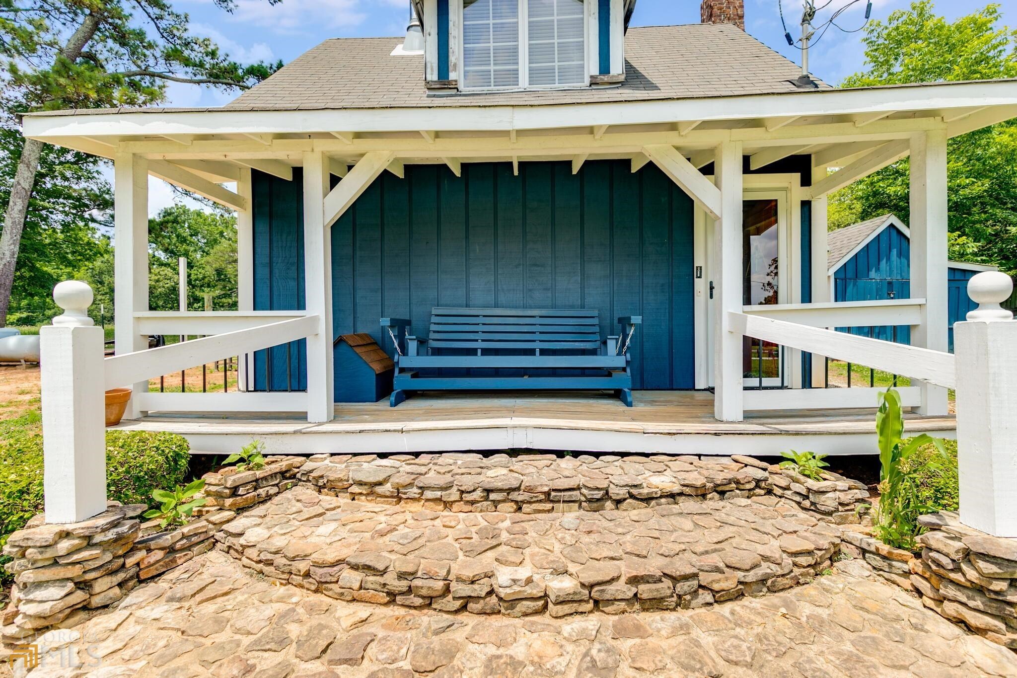 430 Long Branch Road Temple, GA 30179 - Photo 1 of 1 a front view of a house with a wooden fence