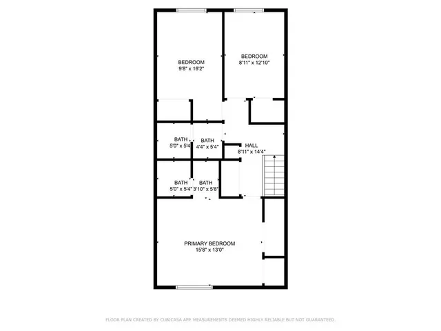 a picture of a bench in front of a wall