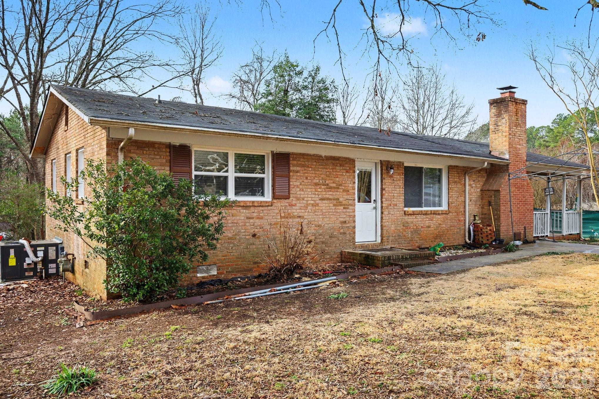 128 Paul Snipes Road Lancaster, SC 29720 - Photo 2 of 29 a front view of a house with a yard