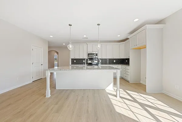 a view of kitchen with wooden floor