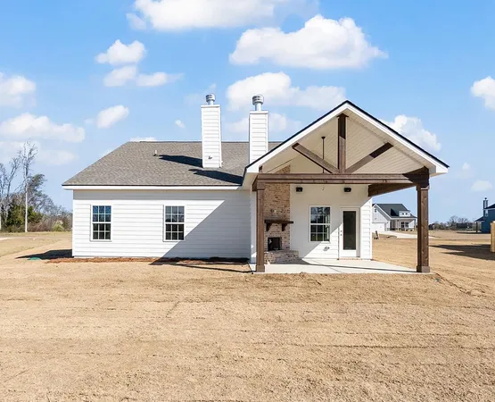 a front view of a house with garage