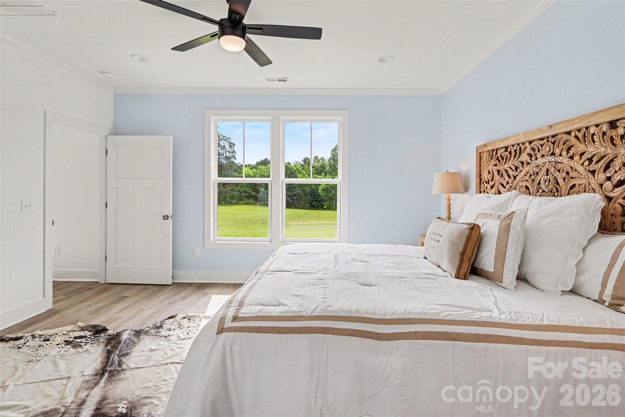 4115 Miller Road Salisbury, NC 28147 - Photo 15 of 26 a bedroom with a large bed and a window