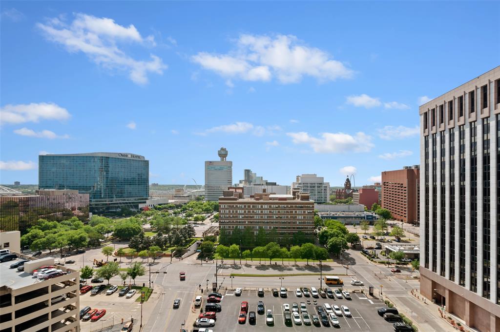 1122 Jackson Street, Unit 313 Dallas, TX 75202 - Photo 11 of 27 a city view with tall buildings