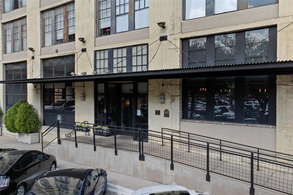 1122 Jackson Street, Unit 313 Dallas, TX 75202 - Photo 2 of 27 a view of a building with sitting area