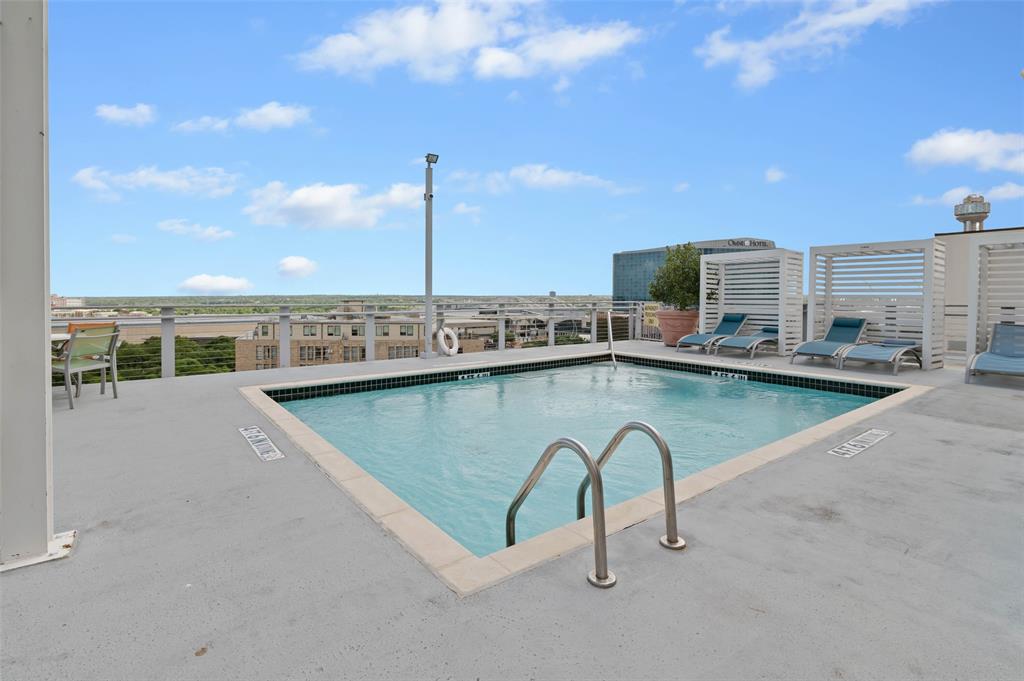 1122 Jackson Street, Unit 313 Dallas, TX 75202 - Photo 24 of 27 a view of a swimming pool with a terrace