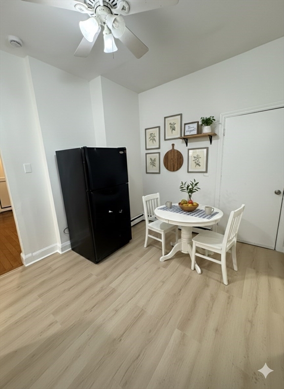 36 Sagamore Street, Unit 3 Lynn, MA 01902 - Photo 15 of 19 a living room with furniture and wooden floor