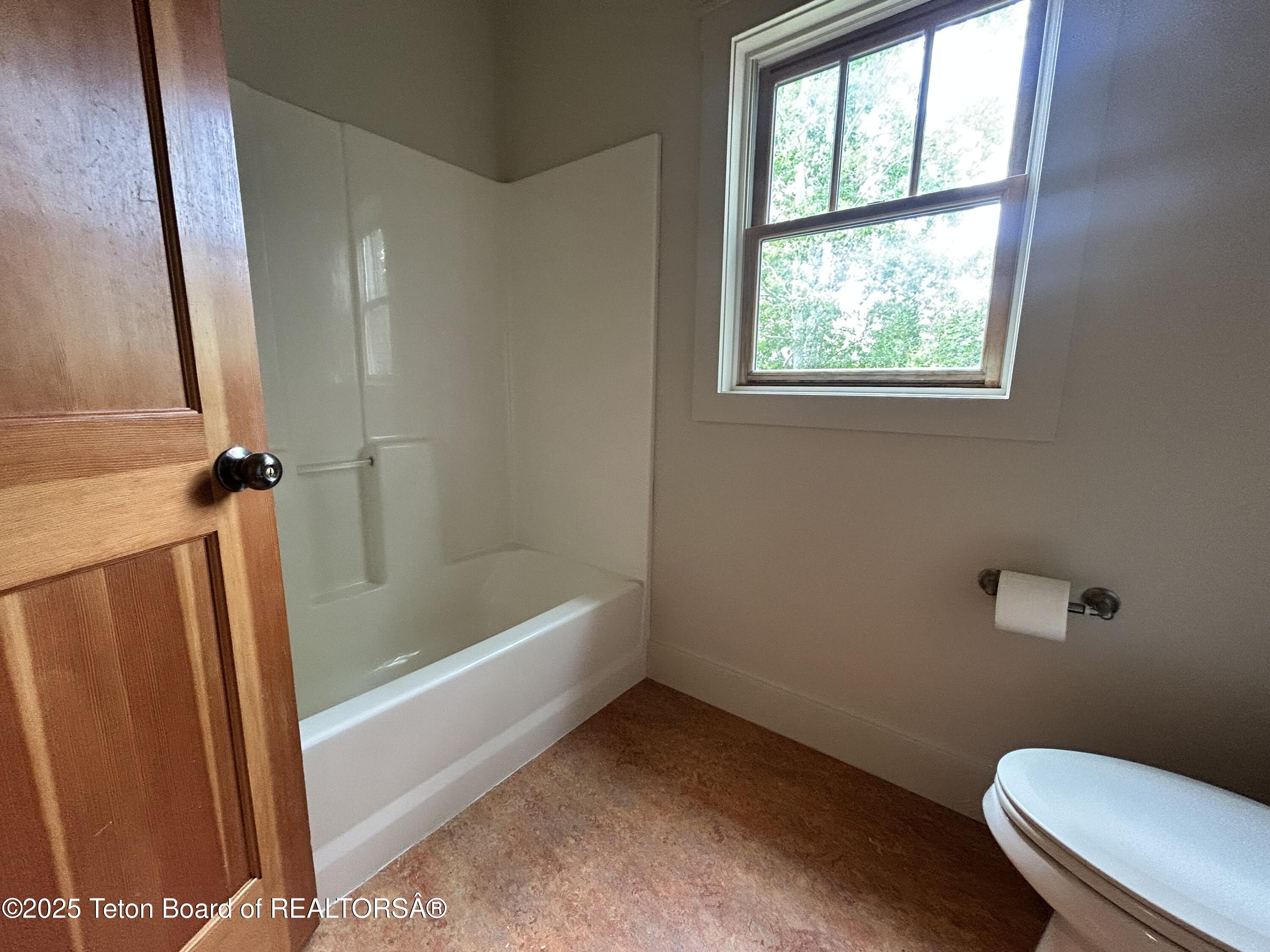 9064 Village Way Victor, ID 83455 - Photo 8 of 25 Main floor bath