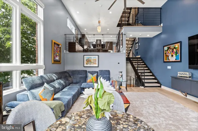 a bathroom with a shower and a sink