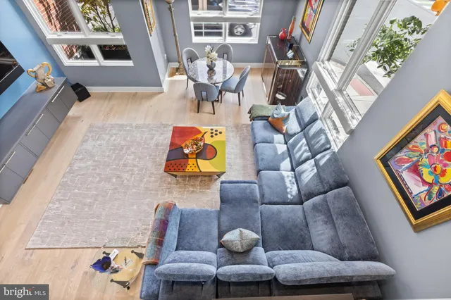 a bedroom with a bed and a couch