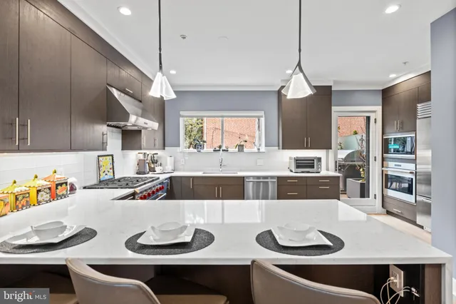 a view of a kitchen with utility room