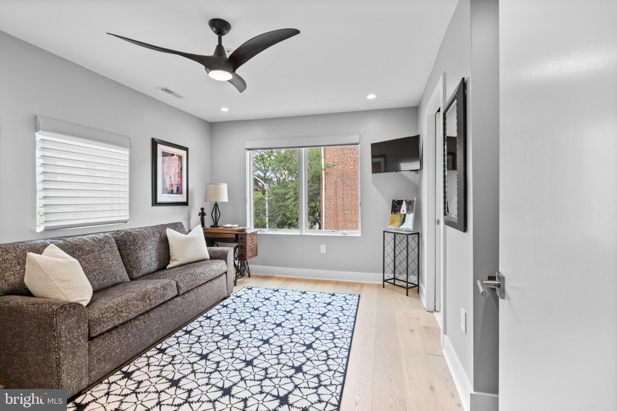 2147 Lombard Street Philadelphia, PA 19146 - Photo 30 of 107 a living room with furniture and a large window