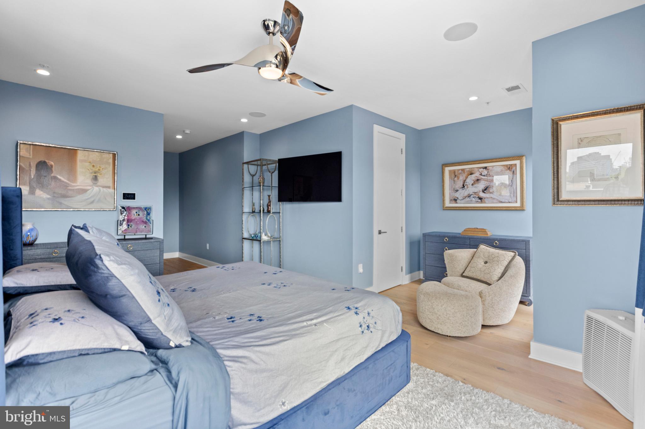 2147 Lombard Street Philadelphia, PA 19146 - Photo 51 of 107 a bedroom with a bed and a couch