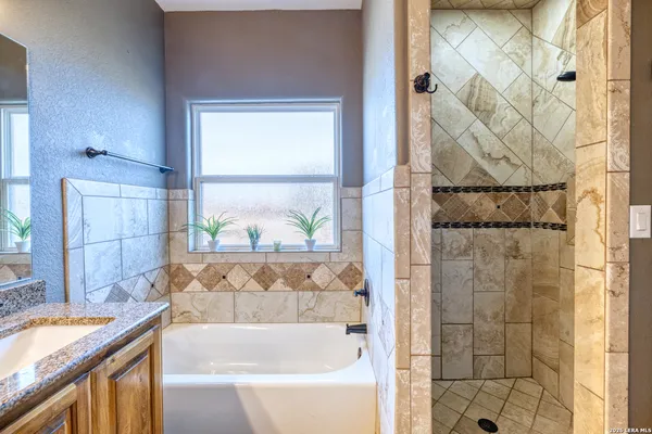 a dining room with a table and chairs
