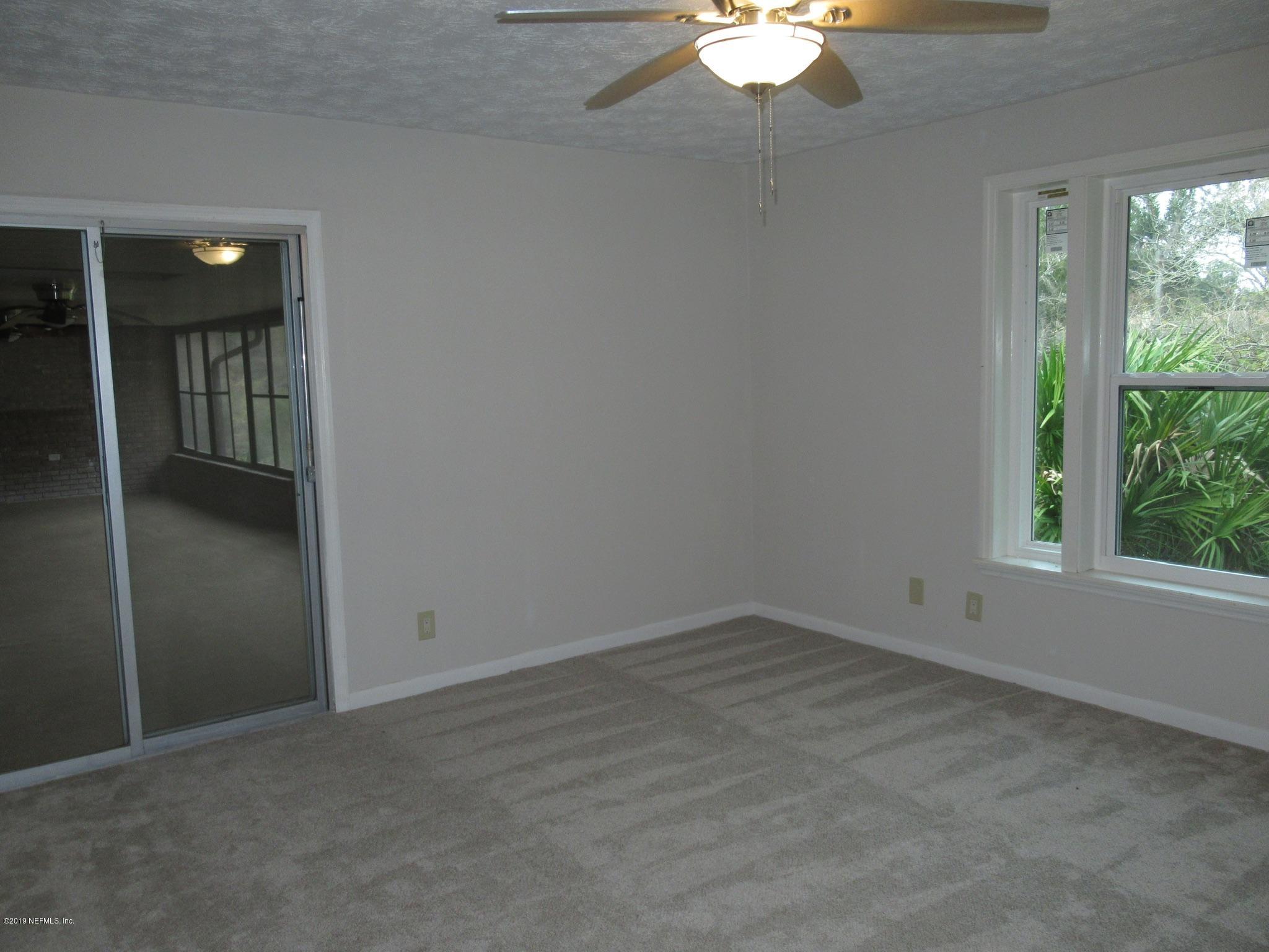 3444 Debussy Road Jacksonville, FL 32277 - Photo 19 of 30 Owner’s Suite - Entrance to Porch
