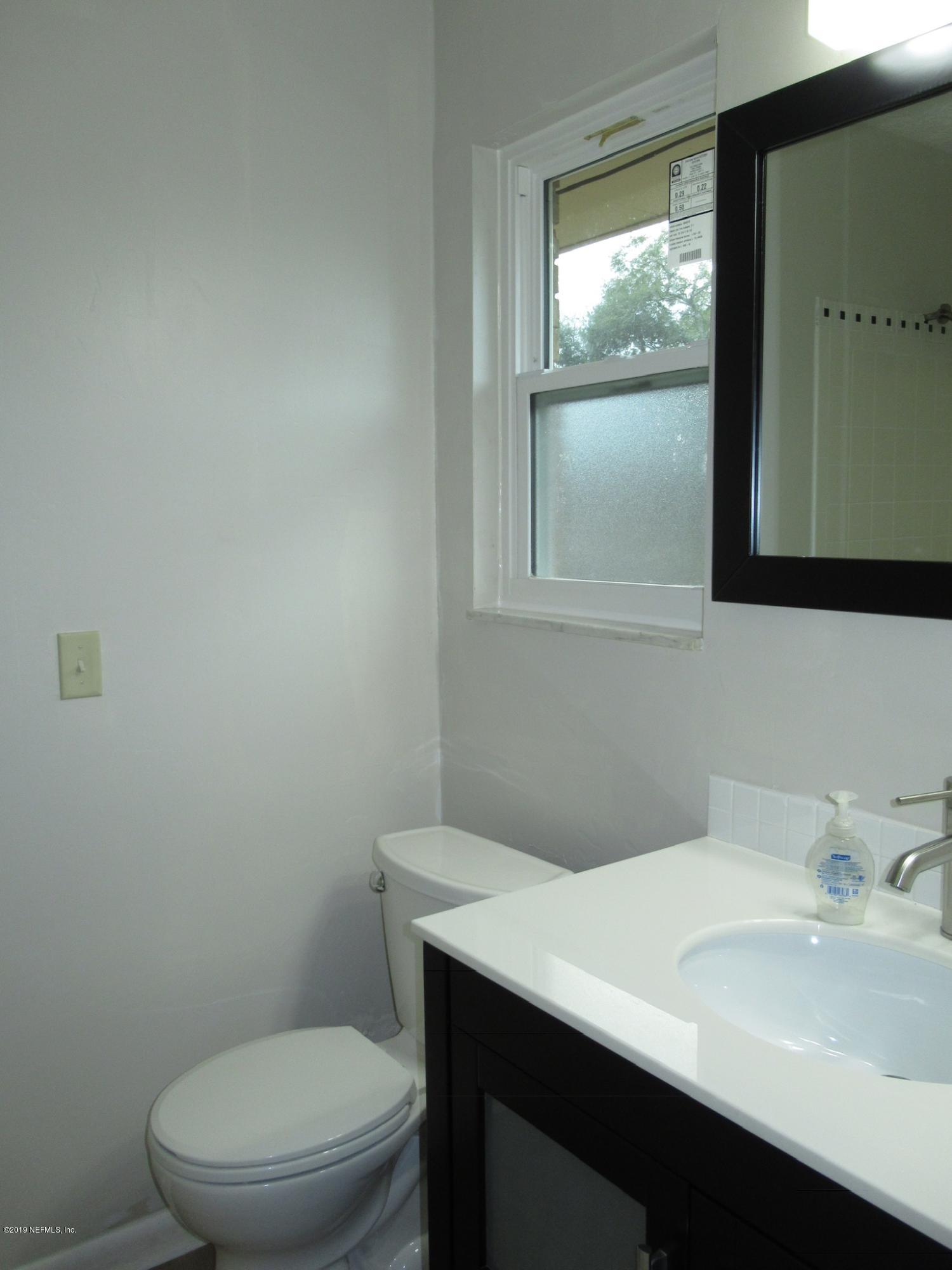 3444 Debussy Road Jacksonville, FL 32277 - Photo 24 of 30 Bedroom 3 - Updated Bathroom