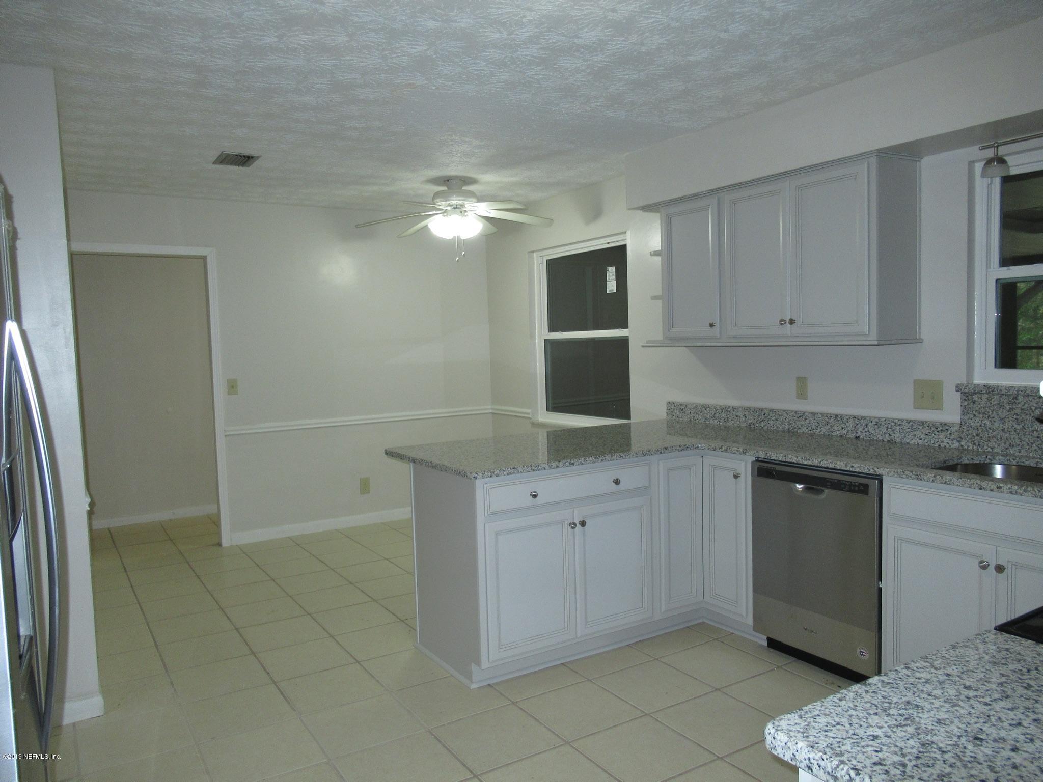 3444 Debussy Road Jacksonville, FL 32277 - Photo 4 of 30 Eat In Kitchen w/ Breakfast Bar