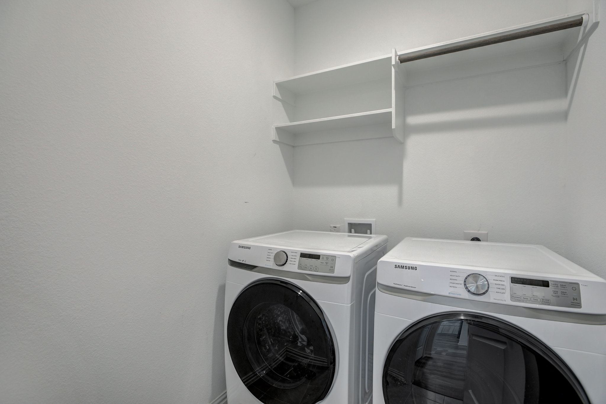 308 Monteforte Road Hutto, TX 78634 - Photo 29 of 32 a utility room with dryer and washer