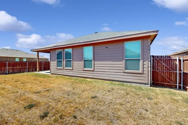 a picture of a bench in front of a door